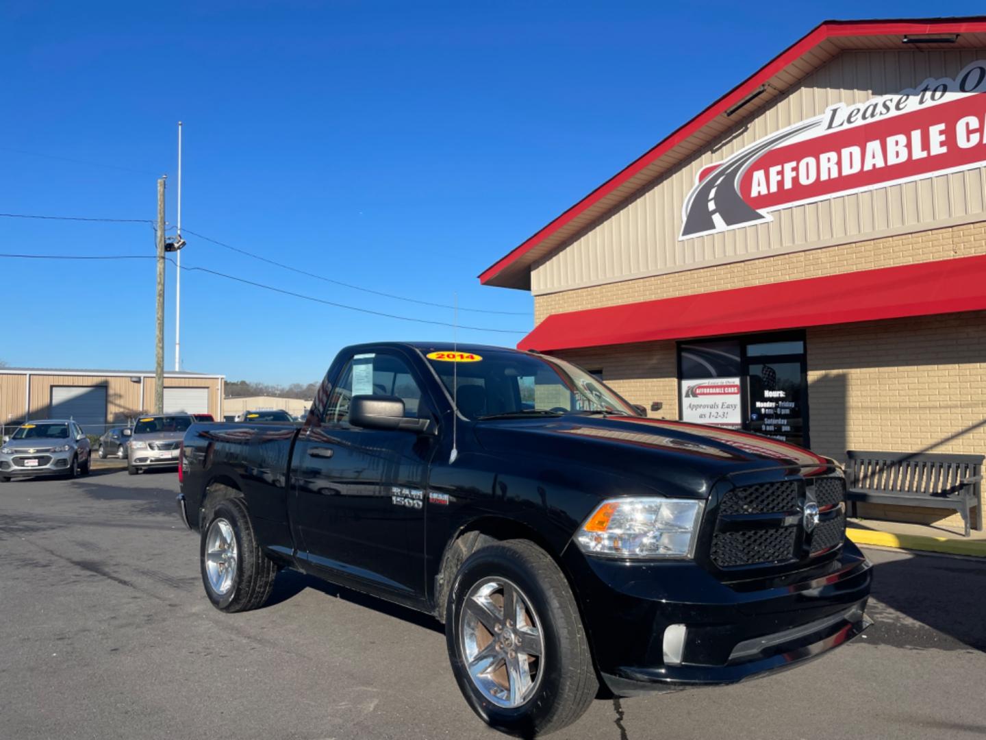 2014 Black Ram 1500 Regular Cab (3C6JR6AT1EG) with an V8, HEMI, 5.7 Liter engine, Automatic, 8-Spd transmission, located at 8008 Warden Rd, Sherwood, AR, 72120, (501) 801-6100, 34.830078, -92.186684 - Photo#1